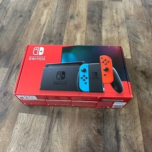 Nintendo Switch Console with Blue and Red Joy-Con